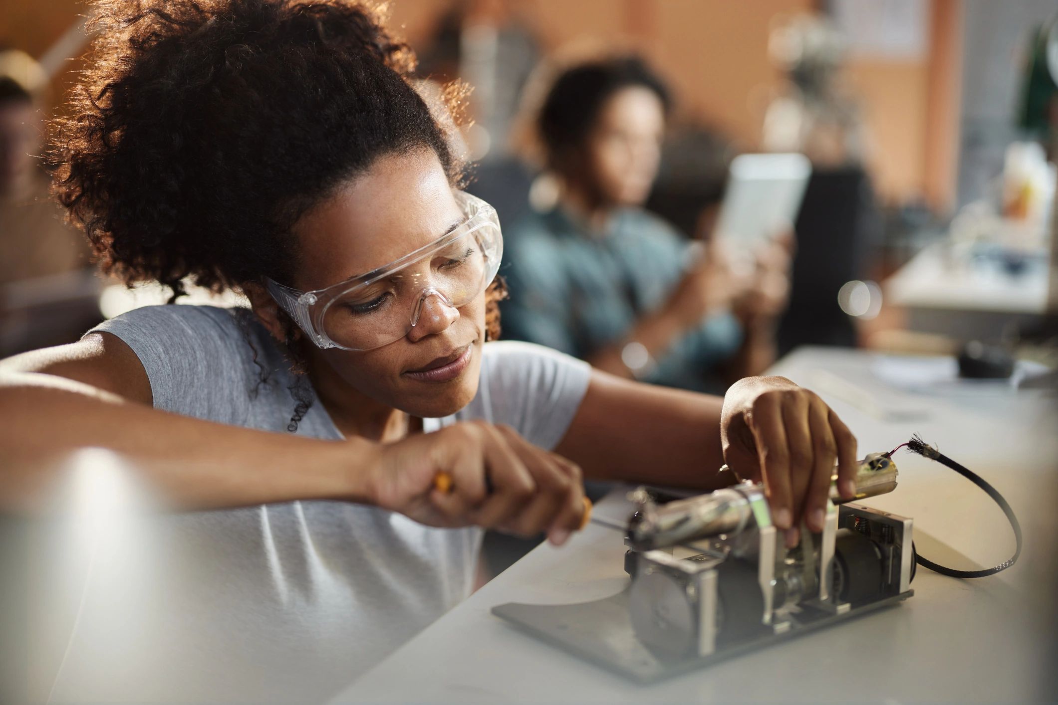 Human factors engineer testing a prototype in a lab
